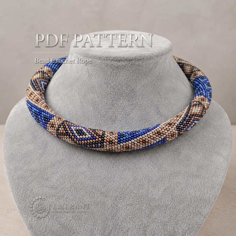 May include: A circular bead crochet rope necklace featuring a geometric pattern in shades of blue, tan, black, and white. The text PDF PATTERN Bead Crochet Rope is visible at the top, and the word EMERANT is visible at the bottom left.