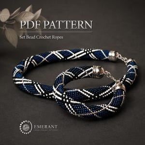 May include: A PDF pattern for a set of bead crochet ropes featuring a dark blue, black, and white plaid-like geometric pattern. The jewelry set includes a necklace and a bracelet with silver-toned metal end caps and clasps. Text reads PDF PATTERN Set Bead Crochet Ropes and EMERANT BEAD CROCHET PATTERNS.