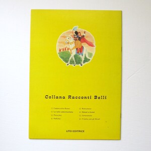 May include: A yellow book cover featuring an illustration of a prince and princess riding a white horse. The book title is "Collana Racconti Belli" and lists the following titles: Cappuccetto Rosso, La bella addormentata, Pinocchio, Pollicino, Biancaneve, H&auml;nsel e Gretel, Cenerentola, and Gatto con gli Stivali. The book is published by Lito Editrice.