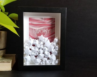 Framed Origami Paper Lucky Stars - Interactive 6x8" Black Shadow Box Art - Embroidered Typography Art on Red Lenticular Card