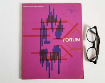 May include: A pink magazine cover with the title "FORUM" in yellow letters. The cover features a geometric design with red and blue lines and shapes.