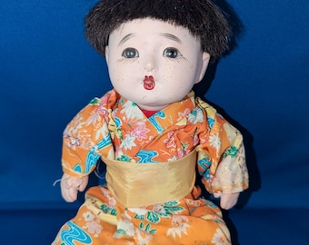 Ichimatsu Gofun boy doll 10" Antique composition, hollow torso with squeaker (not working) limbs strung well, please review pics, some flaws