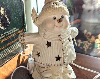 Skiiing Snowman Figurine Lighted International Bazaar 9.5" Ivory Bisque and Gold christmas, winter