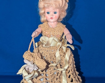 Duchess Doll Co 1948 7" Doll - Blond hair, blue sleepy eyes, dull yellow dress - vintage plastic mold, poseable limbs - vintage antique
