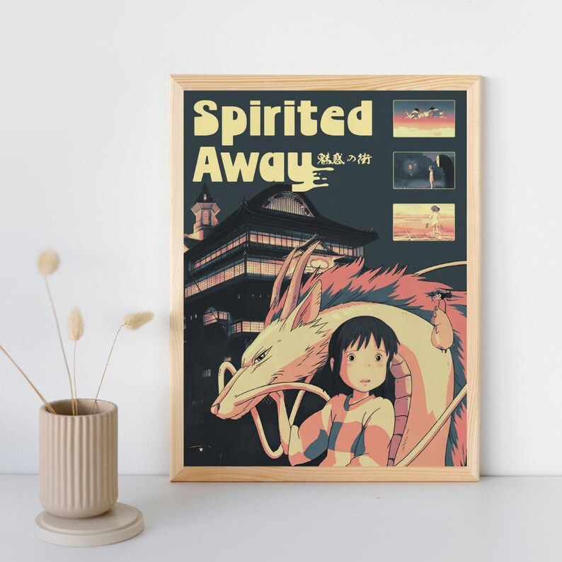 May include: A rectangular wall poster featuring the title Spirited Away in yellow text, a dark building, and an illustration of a young person with dark hair standing next to a large, light-colored dragon. Three small scene panels are on the right.