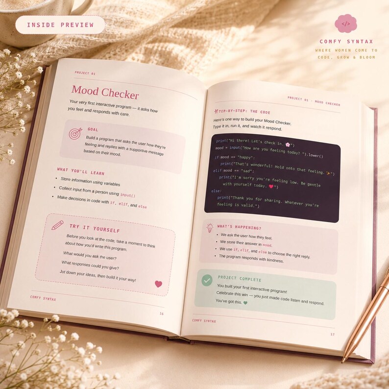May include: An open book titled Comfy Syntax displaying a Mood Checker coding project. The page features sections for goals, learning objectives, and a step-by-step code block with Python syntax. The layout includes soft pink and green accents.