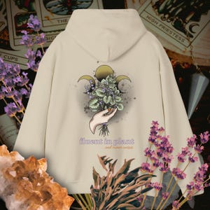 Fluent in Plant Hoodie | Witchy Herb Hand Graphic, Vintage Moon Phases Botanical Hoodie