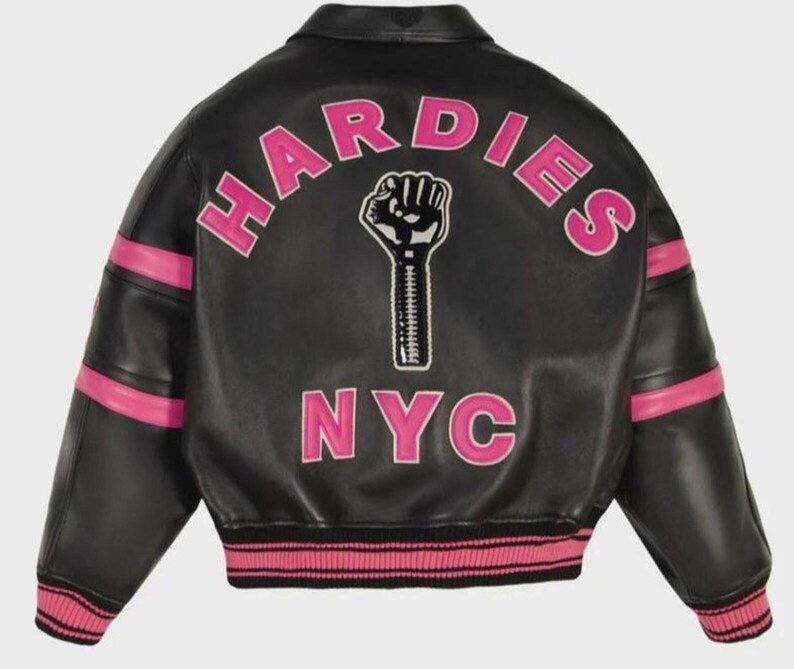 May include: A black leather bomber jacket featuring pink stripes on the sleeves and pink ribbed cuffs and hem. The back displays the text HARDIES in a pink arch, the text NYC in pink below, and a central graphic of a black fist with a zipper.
