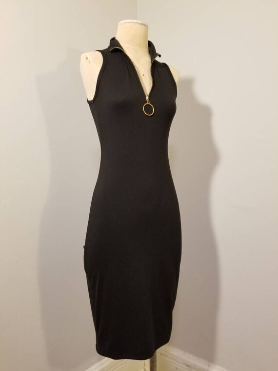 green emerald velvet dress Louis Vuitton Black Short Dress with LV Gold Zipper Detailing FR 34 (U –  Sellier main image 0