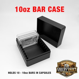 May include: A black rectangular storage box with a removable lid, designed to hold 10oz bars in capsules. The interior features slotted dividers for organization. The text 10oz BAR CASE and HOLDS 10 - 10oz BARS IN CAPSULES is visible.