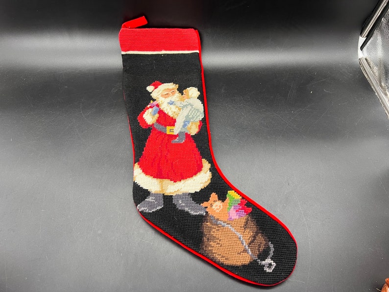 Peking Handicraft Vtg Wool Santa and Child Needlepoint Stocking Black Velvet Backer image 1