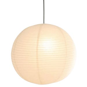 May include: A spherical pendant lamp featuring a white paper shade with horizontal ribbed detailing. The round light fixture is suspended from a thin black cord, creating a soft, diffused glow across the surface of the paper material.
