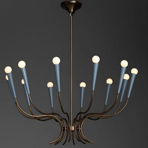 May include: A multi-arm chandelier featuring a central bronze-toned rod and curved metal arms. Each arm ends in a light blue conical socket holding a small, round, glowing white light bulb. The fixture is suspended from a matching bronze canopy.