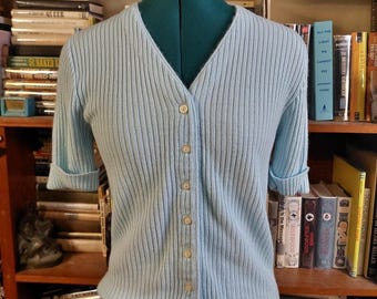 Vintage baby blue short sleeve cardigan.