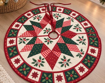 May include: A circular Christmas tree skirt featuring a central star pattern in red, dark green, and white gingham. The design includes holly leaf and berry motifs, a red border, and two red fabric ties at the top for securing the skirt around a tree.