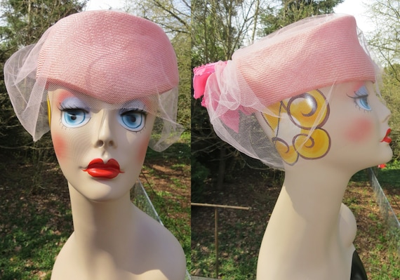 Vintage pink 50s net fascinator hat with pink bow/