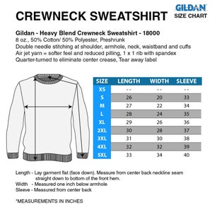 May include: A size chart for a Gildan crewneck sweatshirt. The chart shows the measurements in inches for different sizes, including XS, S, M, L, XL, 2XL, 3XL, 4XL, and 5XL. The measurements include length, width, and sleeve length.