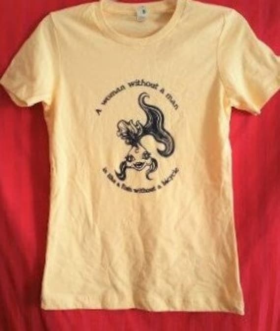 A Woman Needs A Man Like A Fish Needs A Bicycle T-Shirt A Woman Needs A Man Like A Fish Needs A Bicycle T-Shirt