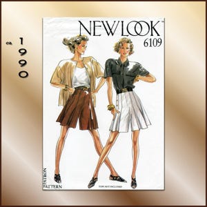 May include: A New Look 6109 sewing pattern envelope from circa 1990 featuring illustrations of two outfits. One shows a tan jacket over a white top and brown pleated shorts. The other shows a black shirt over white pleated shorts. Text reads TOPS NOT INCLUDED.
