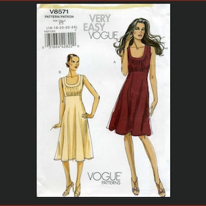 May include: A Vogue sewing pattern envelope V8571 featuring illustrations of a sleeveless dress with a scoop neckline and gathered bodice detail. The pattern includes sizes 16, 18, 20, 22, and 24, shown in both a light cream and a dark maroon color.