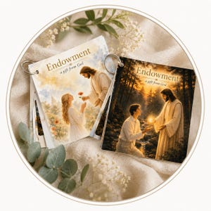 May include: A flip book bound with a silver metal ring featuring square cards with religious illustrations. Each card displays the text "Endowment a gift from God" above scenes of a figure in robes interacting with others in nature settings.