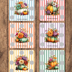 May include: Six square cards featuring vertical stripes in light blue, pink, orange, purple, yellow, and green. Each card displays a central illustration of a pumpkin adorned with colourful flowers and the text AnnaBananaBudgets at the bottom.