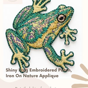 May include: An embroidered frog patch featuring a shiny, multi-colored design in shades of green, yellow, and purple. The patch measures 2 inches by 2.25 inches and includes text that reads Shiny Frog Embroidered Patch, Iron On Nature Applique.