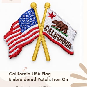 May include: An embroidered iron-on patch featuring two crossed gold flagpoles. One flag is the United States flag with red and white stripes and a blue field with white stars. The other is the California state flag with a brown bear, red star, and the text CALIFORNIA.