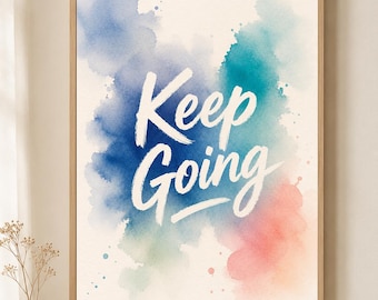 May include: A framed wall art print featuring the white hand-lettered text Keep Going centered over a background of blended watercolor washes in shades of blue, teal, and soft coral on a cream-colored paper texture background.