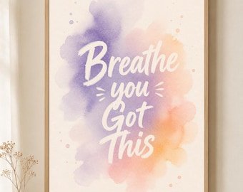 May include: A framed wall art print featuring a watercolor background with blended purple, pink, and orange hues. The white text in the center reads, "Breathe you Got This," with small decorative dashes on either side of the word "you."