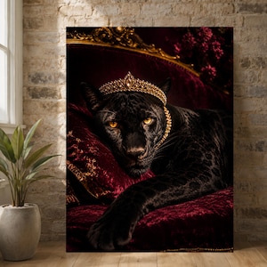 May include: A wall art print featuring a black panther resting on a deep red velvet cushion. The panther wears an ornate gold crown with small white accents. The background shows a dark, rich setting with hints of gold trim and floral elements.