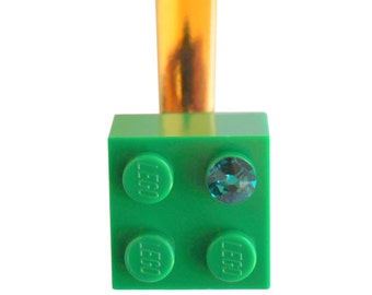 Dark Green LEGO® brick 2x2 with a Green SWAROVSKI® crystal on a Silver/Gold hair clip (one piece)