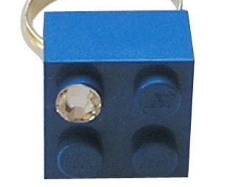 Dark Blue LEGO® brick 2x2 with a ‘Diamond’ color SWAROVSKI® crystal on a Silver/Gold plated adjustable ring finding