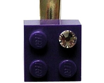 Purple LEGO® brick 2x2 with a ‘Diamond’ color SWAROVSKI® crystal on a Silver/Gold hair clip (one piece)