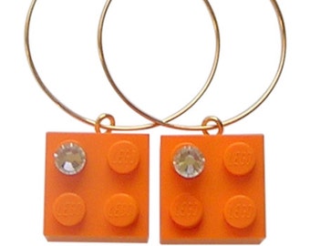 Orange LEGO® brick 2x2 with a 'Diamond' color SWAROVSKI® crystal on a Silver/Gold plated hoop