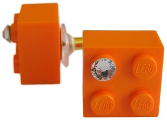 Orange LEGO® brick 2x2 with a 'Diamond' color SWAROVSKI® crystal on a Silver/Gold plated stud