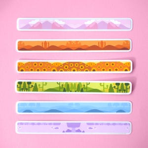 May include: Six long, rectangular stickers arranged vertically. Each sticker features a unique landscape illustration, including pink mountains, orange desert dunes, yellow sunflowers, green forests, blue rolling hills, and a light purple meadow scene.