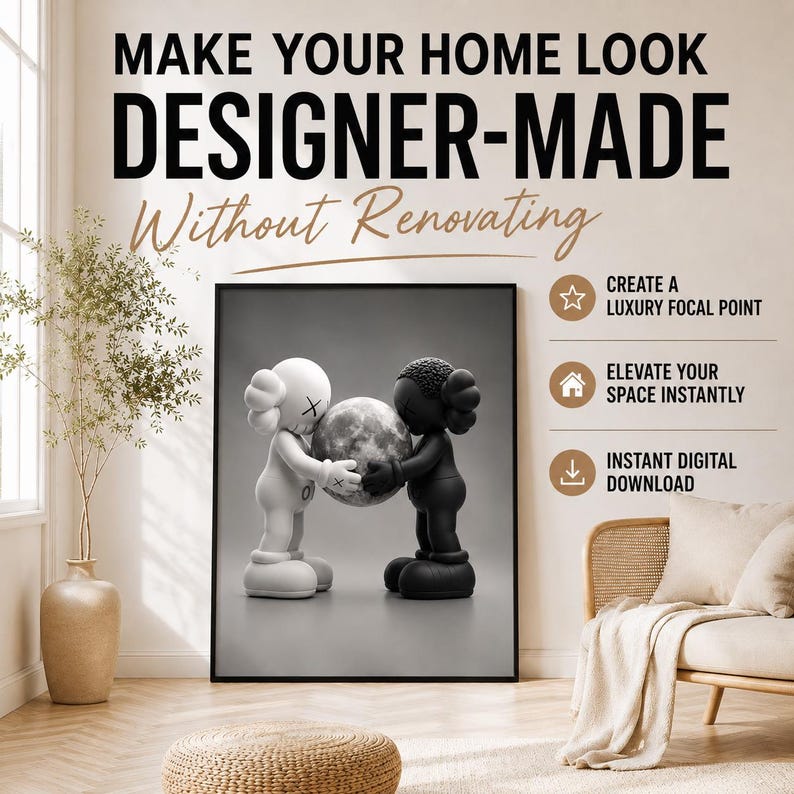 May include: A framed wall art print featuring a white figure and a black figure holding a moon between them. The text reads: MAKE YOUR HOME LOOK DESIGNER-MADE Without Renovating, CREATE A LUXURY FOCAL POINT, ELEVATE YOUR SPACE INSTANTLY, INSTANT DIGITAL DOWNLOAD.