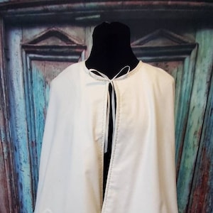 White wedding cape-let with hidden pockets