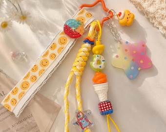 Llavero Kawaii hecho a mano, estrella arcoíris, donut, helado, accesorio para bolso con carita sonriente