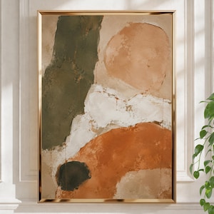 May include: A framed abstract painting featuring large, textured color blocks in olive green, terracotta orange, beige, and white. The composition includes a prominent dark circular shape at the bottom and layered paint strokes with visible depth and texture.