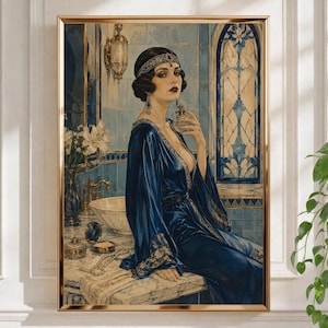 May include: A framed art print depicting a person in a dark blue silk robe with gold trim, wearing a jeweled headband. The person holds a perfume bottle in a tiled bathroom with a marble vanity, a vase of white lilies, and a stained glass window.