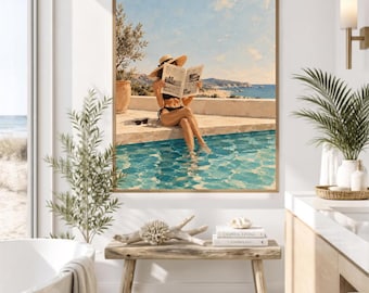 Peut inclure: Une impression d'art mural rectangulaire représentant une peinture d'une personne portant un chapeau de paille et un maillot de bain noir, assise au bord d'une piscine, lisant un journal avec un paysage côtier, un ciel bleu et un olivier.