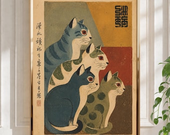 May include: A framed art print featuring four stylized cats in a vertical arrangement. The cats are depicted in shades of blue, green, and cream against a background of yellow, red, and brown blocks. The print includes black Japanese calligraphy.