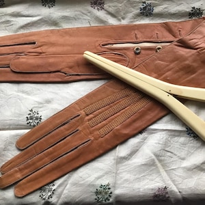 Antique ladies gloves collectors dainty handmade tan kid leather unworn gold tone buttons by Hermann early to mid 1800&#39;s