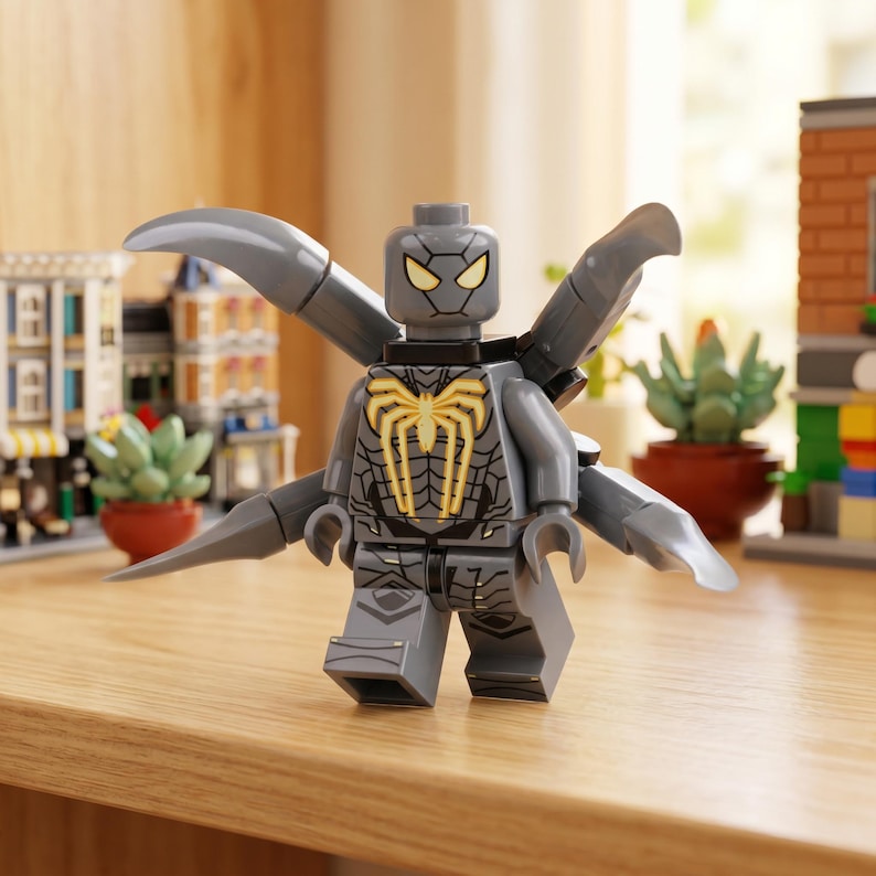 May include: A gray Lego figure of a superhero with a yellow spider emblem on the chest and a matching spider symbol on the head. The figure has multiple gray appendages extending from the back.