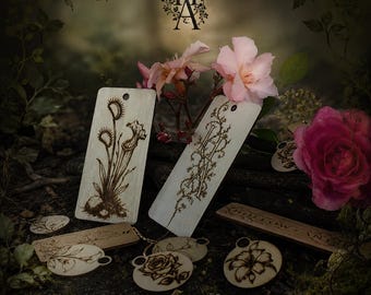 Botanical Collection - Set of 4 laser-engraved wooden pendants, 3 keychains, and 2 bookmarks. Handmade wooden forest accessories.