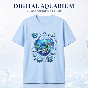 May include: Light blue unisex t-shirt with the text "DIGITAL AQUARIUM" and a graphic of an aquarium inside a bubble. The aquarium graphic features colorful fish and aquatic plants. The shirt is surrounded by other bubbles.