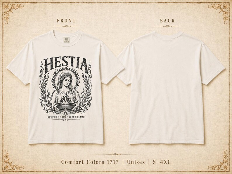 May include: A white t-shirt featuring a graphic of Hestia, the Greek goddess of the hearth, with the text "HESTIA" above her and "KEEPER OF THE SACRED FLAME" below. The back of the shirt is plain white. The shirt is labeled as Comfort Colors 1717, Unisex, and available in sizes S-4XL.