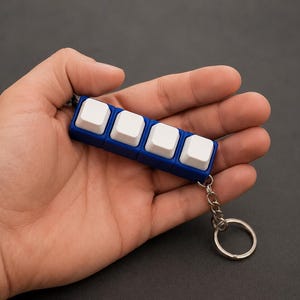 Portachiavi antistress con clicker | Clicker a 4 pulsanti | Giocattolo antistress | Clicker meccanico | Gadget EDC per la vita di tutti i giorni e l'ufficio